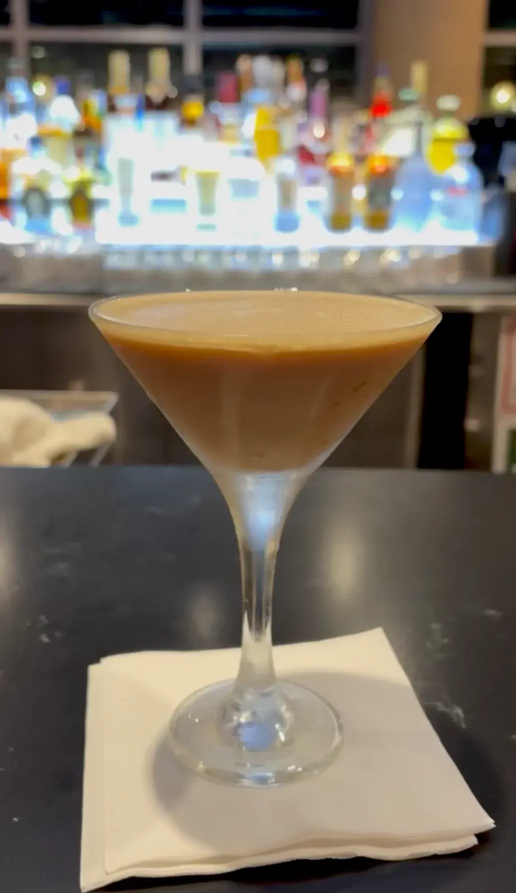 Creamy espresso martini cocktail in classic martini glass at K Park Bar Honolulu