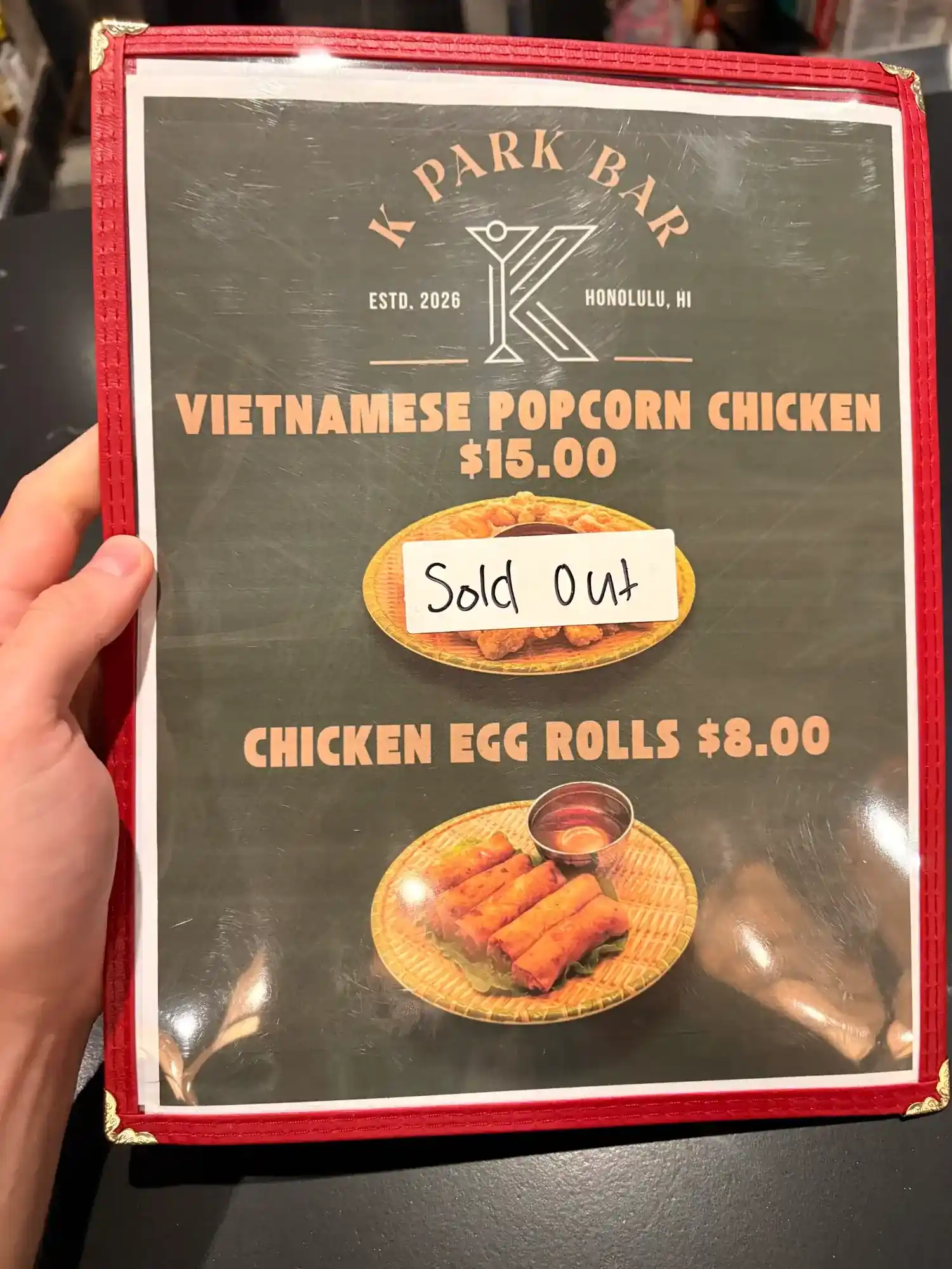 K Park Bar food menu showing Vietnamese Popcorn Chicken $15 and Chicken Egg Rolls $8