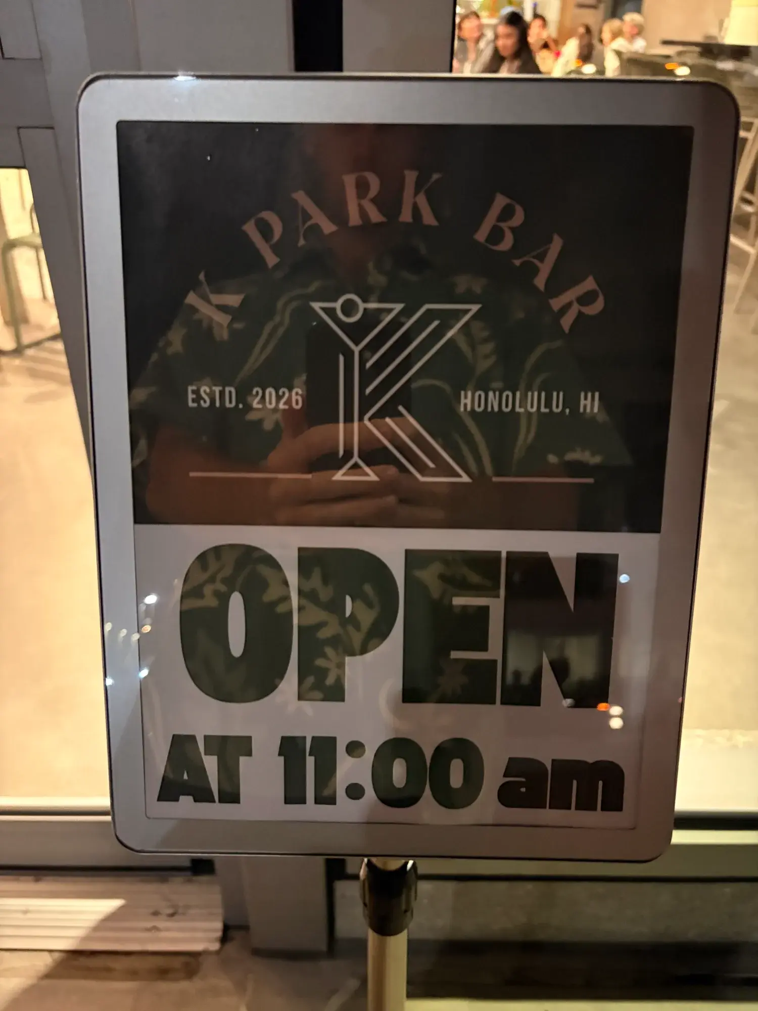 K Park Bar entrance sign showing Established 2026 Honolulu HI with opening hours