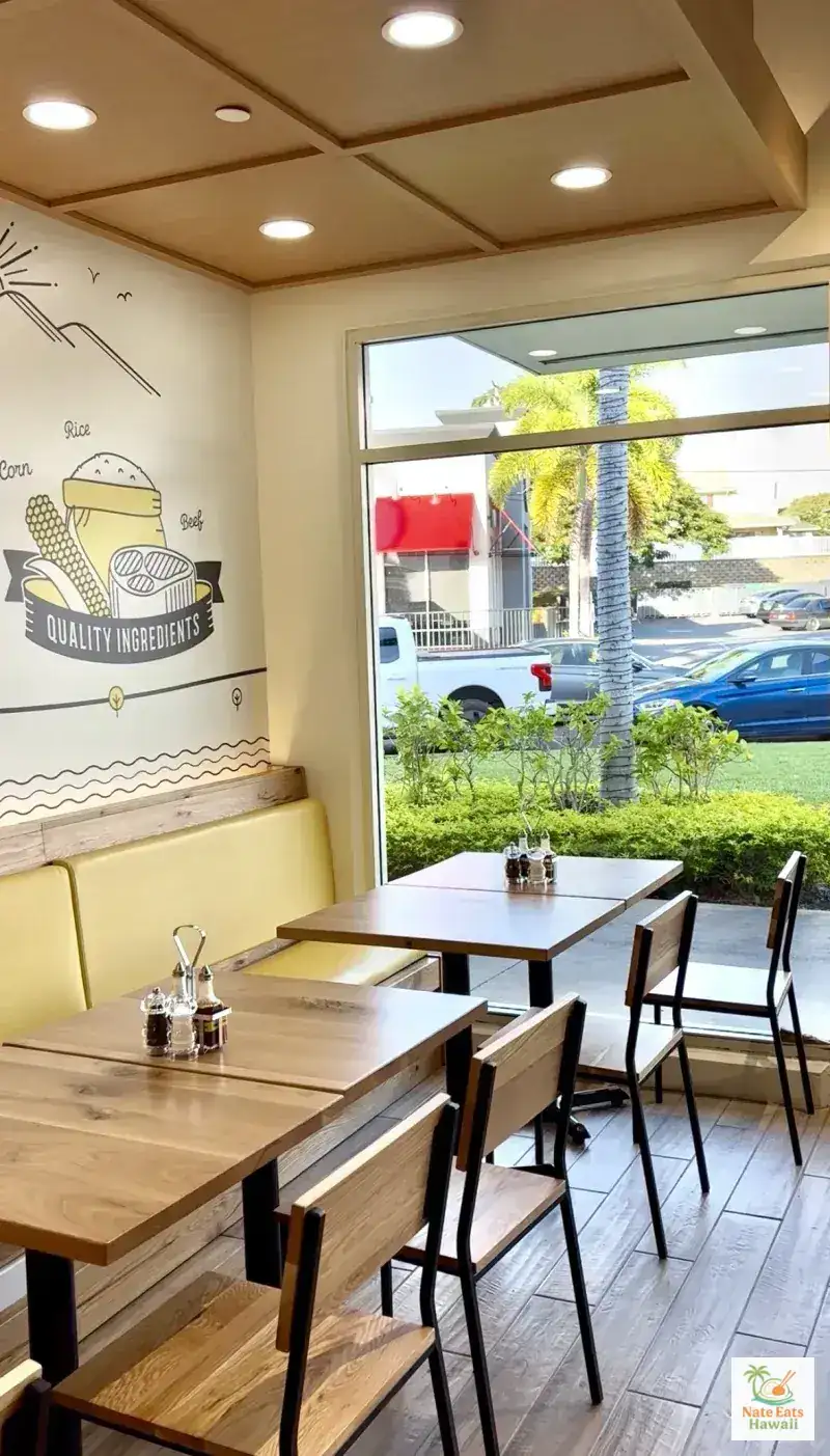 Pepper Lunch Hawaii seating area with Quality Ingredients wall art